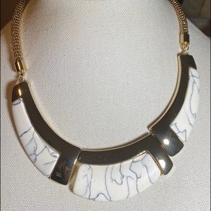 Marble bone and gold necklace.